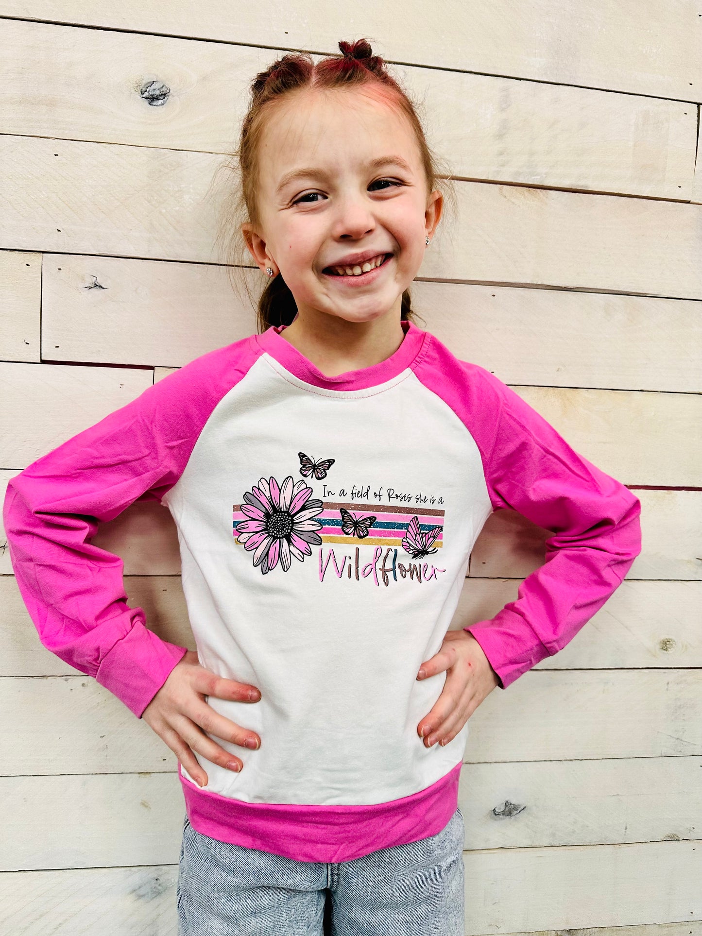 “In a Field of Roses, She is a Wildflower” Raglan Top